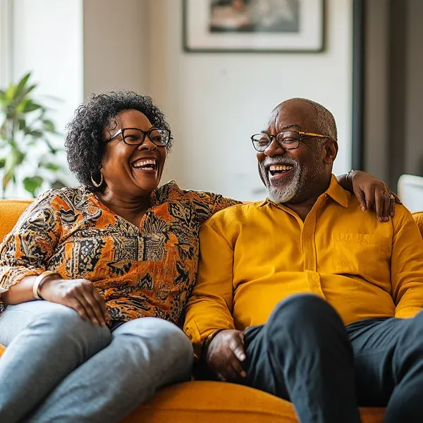 A family sitting together in a supportive counseling conversation.